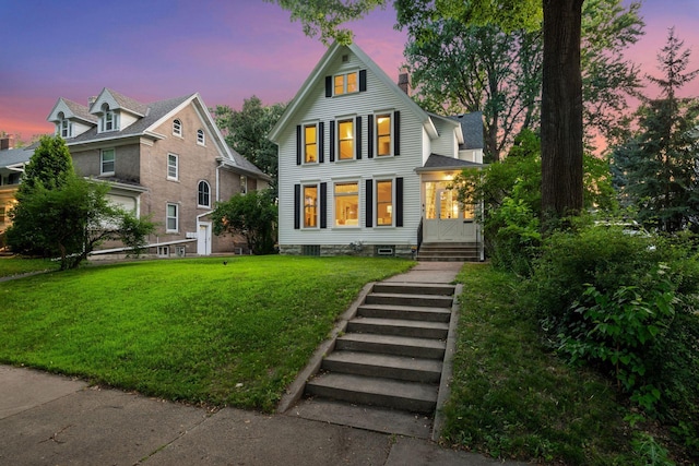 2432 Pleasant Ave, Minneapolis, MN 55404 - traditional home with a chimney and a front yard