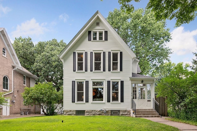 2432 Pleasant Ave, Minneapolis, MN 55404 - view of front facade featuring a front lawn