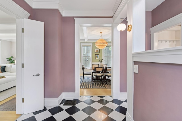 2432 Pleasant Ave, Minneapolis, MN 55404 - hallway featuring tile patterned floors and ornamental molding