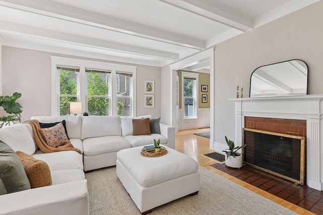 2432 Pleasant Ave, Minneapolis, MN 55404 - living area featuring beamed ceiling, wood finished floors, and a fireplace