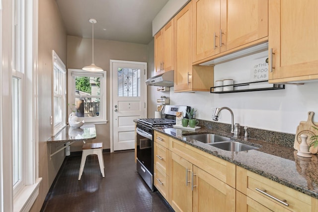 2432 Pleasant Ave, Minneapolis, MN 55404 - kitchen with stainless steel range with gas cooktop, light brown cabinetry, and under cabinet range hood