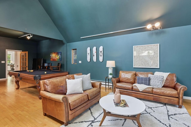 2432 Pleasant Ave, Minneapolis, MN 55404 - living area featuring pool table, a baseboard heating unit, wood finished floors, and high vaulted ceiling