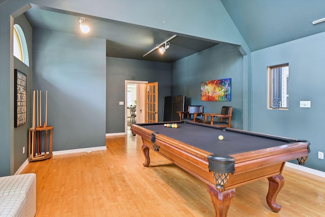 2432 Pleasant Ave, Minneapolis, MN 55404 - playroom with rail lighting, wood finished floors, billiards table, french doors, and high vaulted ceiling
