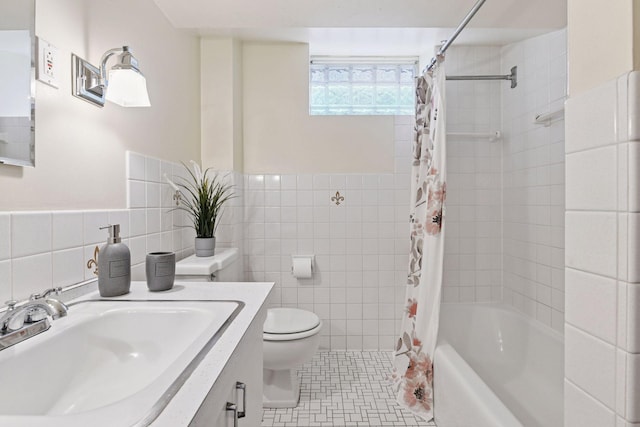 2432 Pleasant Ave, Minneapolis, MN 55404 - full bathroom with tile walls, vanity, shower / bath combo with shower curtain, and tile patterned floors