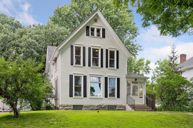2432 Pleasant Ave, Minneapolis, MN 55404 - view of front of house with a front lawn