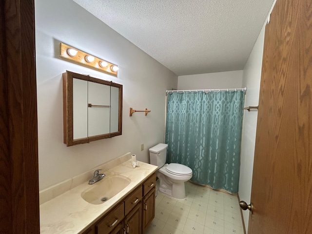 353 River Dr, Park Rapids, MN 56470 - full bath featuring a textured ceiling, vanity, tile patterned floors, and curtained shower