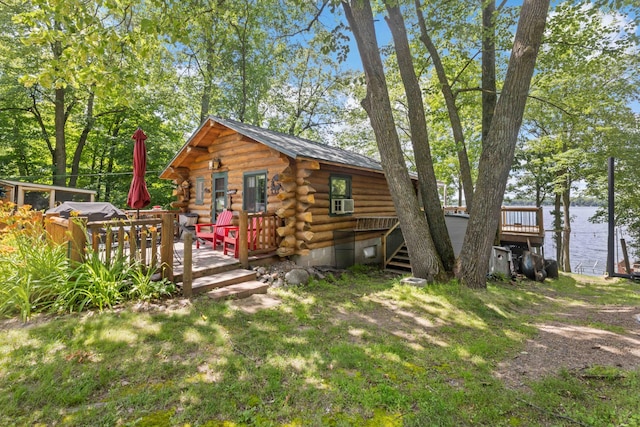 29351 410th Pl, Farm Island Twp, MN 56431 - view of front of property featuring log siding and a deck