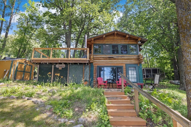 29351 410th Pl, Farm Island Twp, MN 56431 - rear view of property with a shed, a deck, log exterior, and stairs