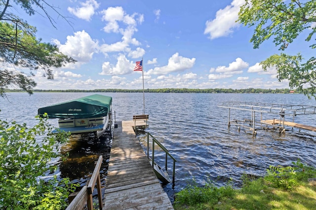 29351 410th Pl, Farm Island Twp, MN 56431 - dock area featuring boat lift and a water view