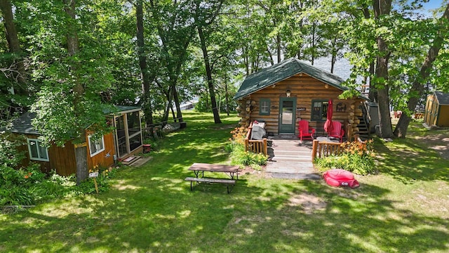 29351 410th Pl, Farm Island Twp, MN 56431 - view of green lawn featuring an outdoor structure