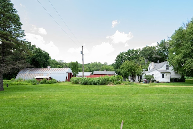 18726 Juneberry Rd, Mankato, MN 56001 - view of green lawn featuring an outbuilding and a pole building