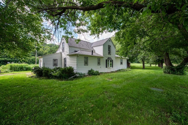 18726 Juneberry Rd, Mankato, MN 56001 - view of property exterior with roof with shingles and a yard