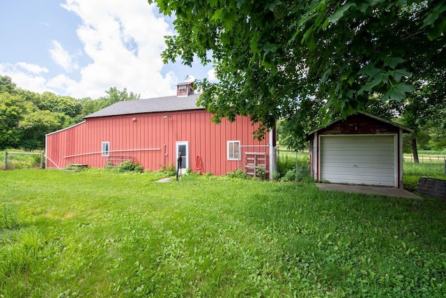 18726 Juneberry Rd, Mankato, MN 56001 - view of yard featuring an outbuilding, a garage, and a pole building