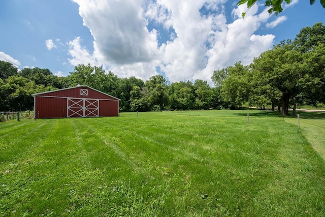 18726 Juneberry Rd, Mankato, MN 56001 - view of grassy yard with a barn and an outbuilding