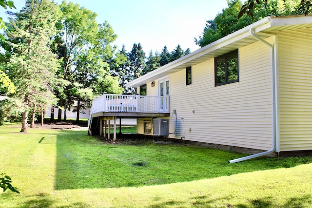 2001 25th St SW, Willmar, MN 56201 - back of house with a wooden deck and a yard