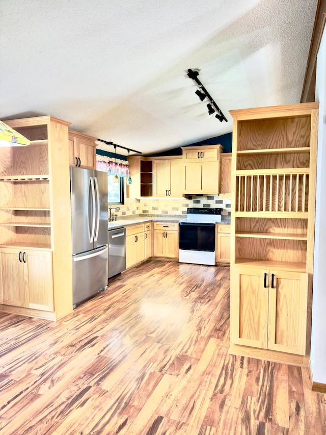 2001 25th St SW, Willmar, MN 56201 - kitchen featuring track lighting, open shelves, appliances with stainless steel finishes, light wood-style flooring, and light brown cabinets