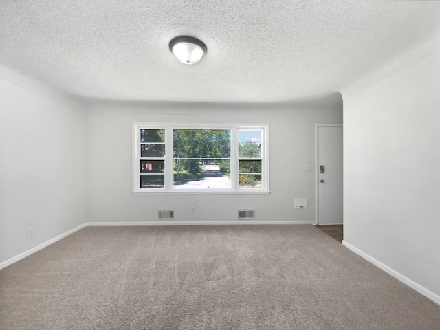 206 Winona St W, West Saint Paul, MN 55118 - unfurnished room featuring carpet and a textured ceiling