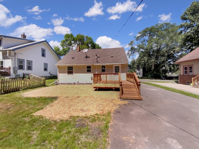 206 Winona St W, West Saint Paul, MN 55118 - rear view of house with a wooden deck, a chimney, and a shingled roof