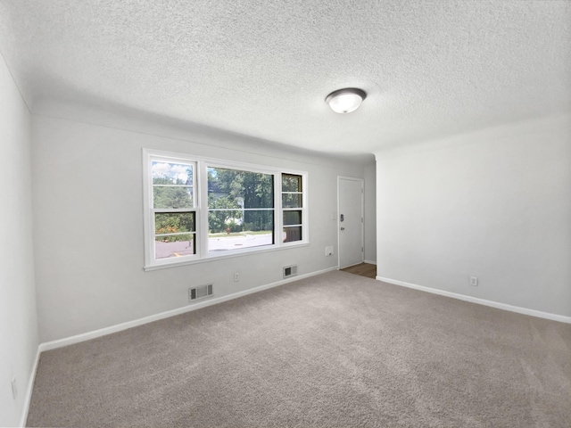 206 Winona St W, West Saint Paul, MN 55118 - carpeted empty room with baseboards and a textured ceiling