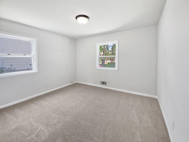206 Winona St W, West Saint Paul, MN 55118 - carpeted empty room featuring baseboards