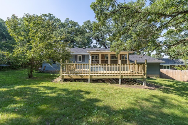 110 Hamilton Dr, River Falls, WI 54022 - back of house with a wooden deck and a shingled roof