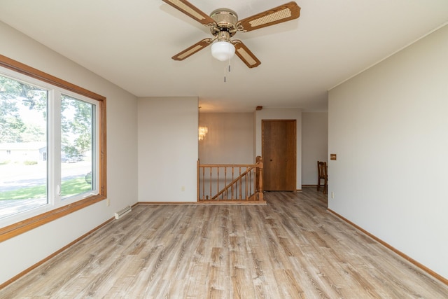 110 Hamilton Dr, River Falls, WI 54022 - unfurnished room featuring light wood-type flooring and a ceiling fan