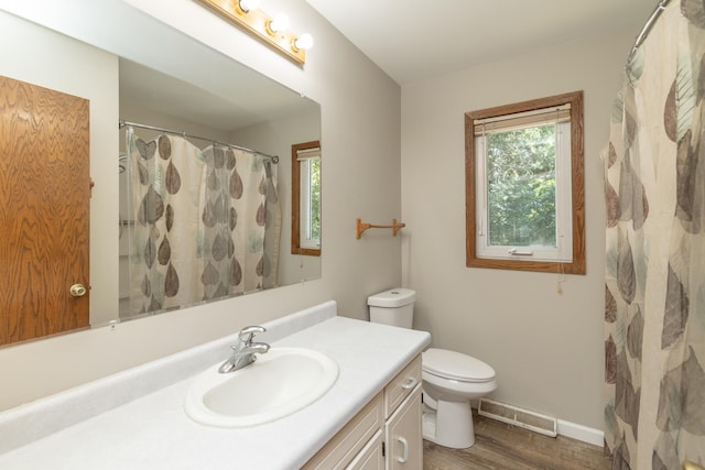 110 Hamilton Dr, River Falls, WI 54022 - bathroom featuring vanity and wood finished floors