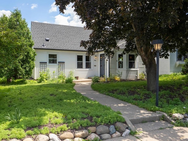 5529 1st Ave S, Minneapolis, MN 55419 - view of front of property featuring a shingled roof and a front lawn
