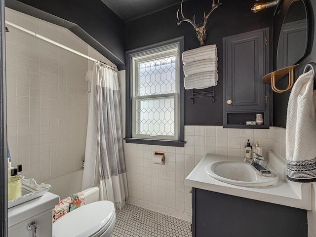 5529 1st Ave S, Minneapolis, MN 55419 - bathroom featuring vanity, shower / bath combo, tile patterned floors, and tile walls
