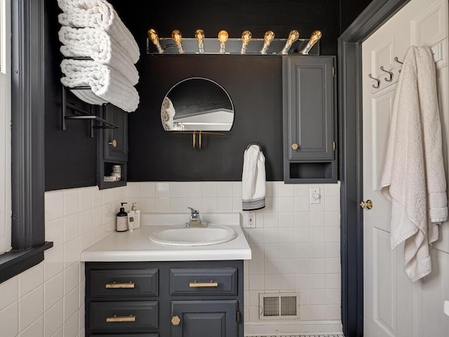 5529 1st Ave S, Minneapolis, MN 55419 - bathroom with vanity and tile walls