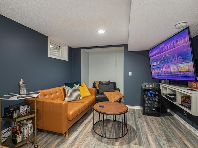 5529 1st Ave S, Minneapolis, MN 55419 - living room with wood finished floors, a textured ceiling, and recessed lighting