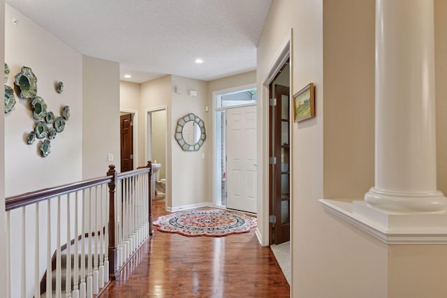 11444 Clarion Way, Minnetonka, MN 55343 - entrance foyer featuring wood finished floors, a textured ceiling, and recessed lighting