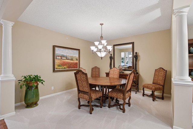 11444 Clarion Way, Minnetonka, MN 55343 - dining space featuring ornate columns, a chandelier, light colored carpet, and a textured ceiling