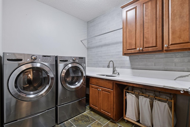 11444 Clarion Way, Minnetonka, MN 55343 - washroom featuring washer and dryer, cabinet space, and a textured ceiling