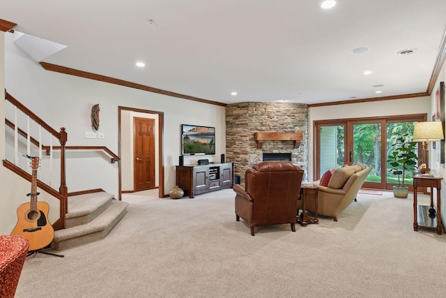 11444 Clarion Way, Minnetonka, MN 55343 - living area featuring light colored carpet, ornamental molding, stairway, recessed lighting, and a stone fireplace