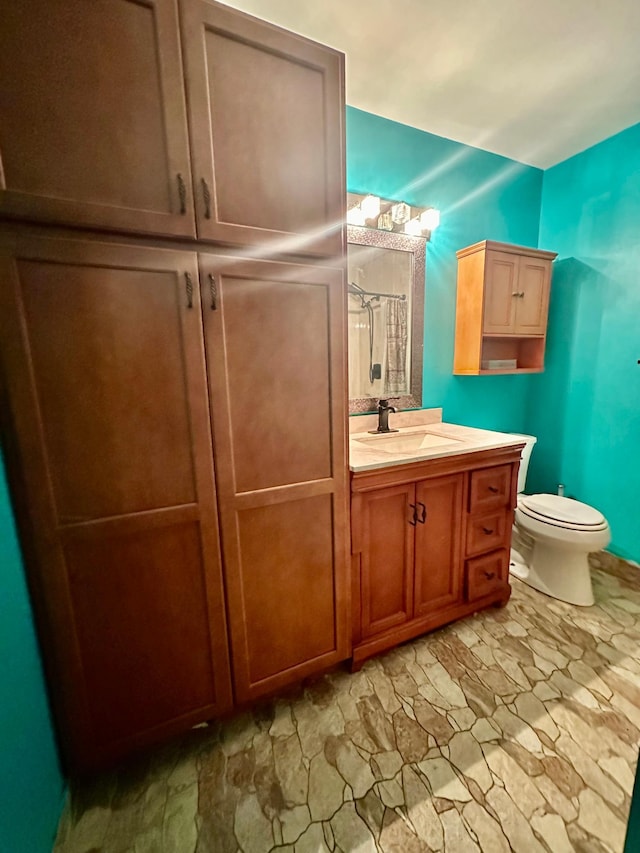 2728 111th Ave NW, Coon Rapids, MN 55433 - bathroom featuring vanity, stone finish flooring, and a shower with curtain