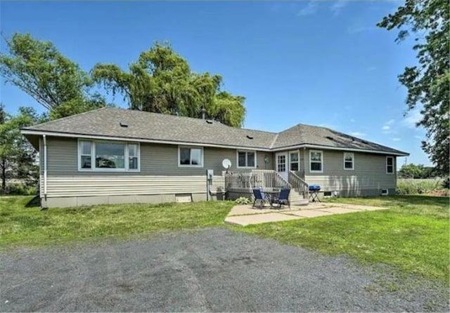 520 Park Island Rd Unit 2, Center City, MN 55012 - back of house featuring a lawn and a patio