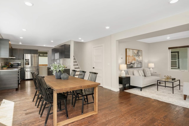 4640 Portland Ave, Minneapolis, MN 55407 - dining room featuring dark wood-style flooring, stairs, and recessed lighting