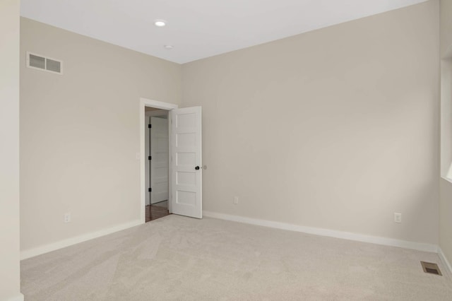 4640 Portland Ave, Minneapolis, MN 55407 - unfurnished room featuring light carpet and recessed lighting