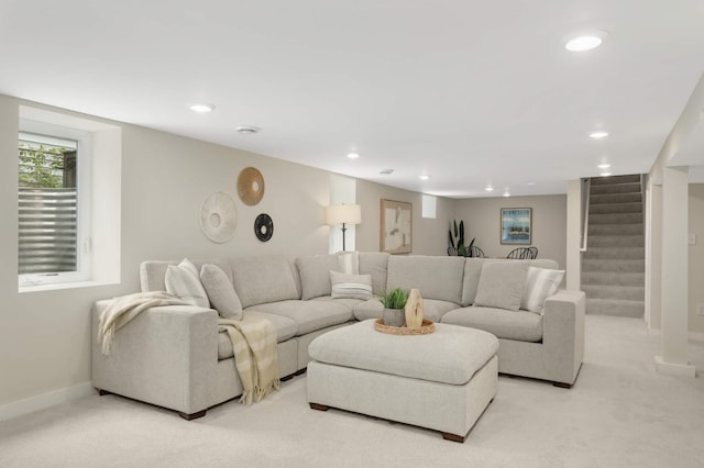 4640 Portland Ave, Minneapolis, MN 55407 - living room with light carpet, recessed lighting, and stairs