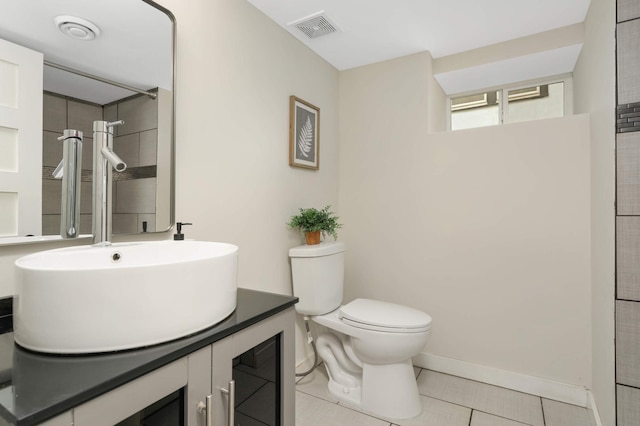 4640 Portland Ave, Minneapolis, MN 55407 - bathroom with vanity, tile patterned flooring, and a shower