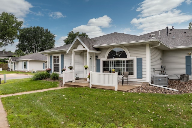 1925 Cabernet Ln NW, Rochester, MN 55901 - rear view of property featuring a yard, a porch, and roof with shingles