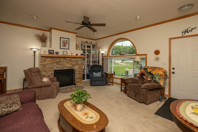 1925 Cabernet Ln NW, Rochester, MN 55901 - living area with carpet, a ceiling fan, crown molding, and a stone fireplace