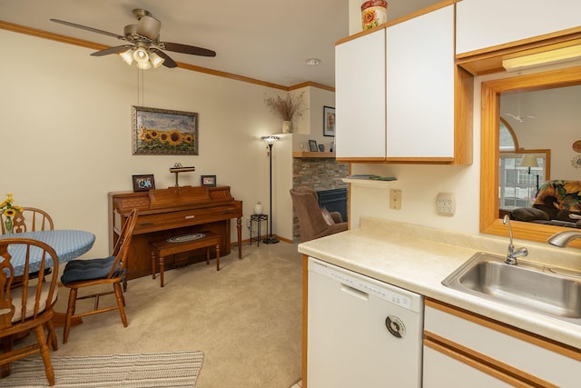 1925 Cabernet Ln NW, Rochester, MN 55901 - kitchen featuring white dishwasher, ceiling fan, white cabinetry, ornamental molding, and light countertops