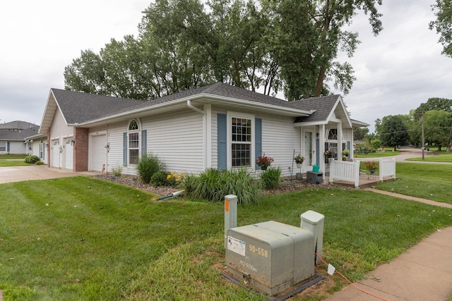 1925 Cabernet Ln NW, Rochester, MN 55901 - ranch-style house with concrete driveway, a front yard, a garage, and roof with shingles