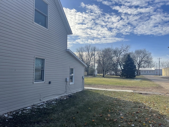 77 Morgan St, Tracy, MN 56175 - view of property exterior featuring a lawn