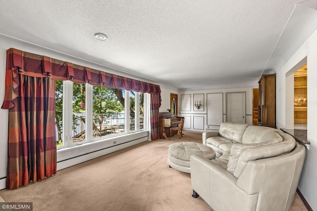 26 Golden Lake Rd, Circle Pines, MN 55014 - living area featuring a textured ceiling, light carpet, and a baseboard radiator