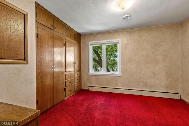 26 Golden Lake Rd, Circle Pines, MN 55014 - unfurnished bedroom with a baseboard heating unit and carpet flooring