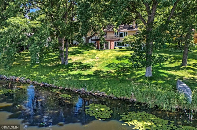 26 Golden Lake Rd, Circle Pines, MN 55014 - view of grassy yard featuring a water view