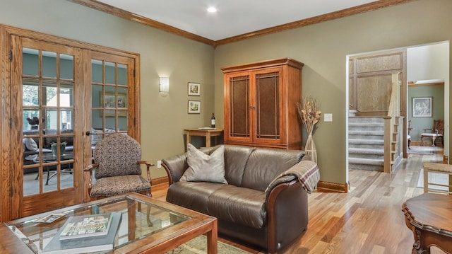 3946 Woodcrest Ct, Eau Claire, WI 54701 - living area featuring crown molding, stairway, french doors, and light wood-style floors